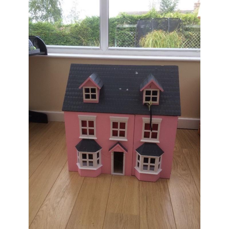Dolls House complete with lots of furniture, people and accessories