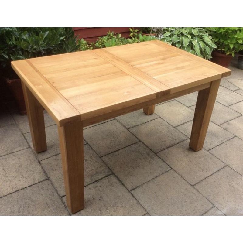 100% Solid Oak Extending Dining Table.