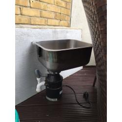 Kitchen sink, tap and waste disposer