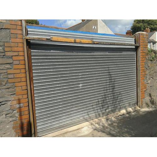 Metal shutter door for garage