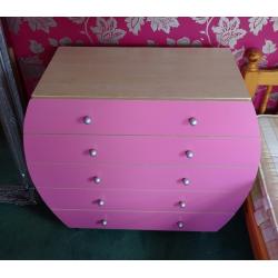 Children's matching pink wardrobe and chest of drawer. Can be bought separately.