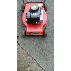 Champion self propelled petrol lawnmower