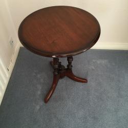 Small dark wood round table