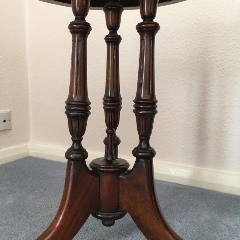 Small dark wood round table