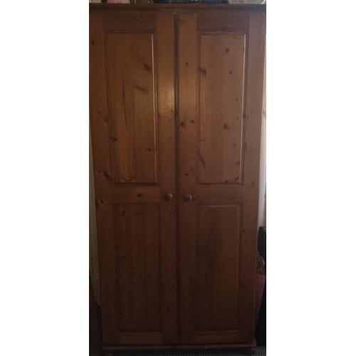 Wooden wardrobe and bedside draws
