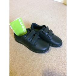 Brand new Crocs. Size 12/13 boys black school shoes.