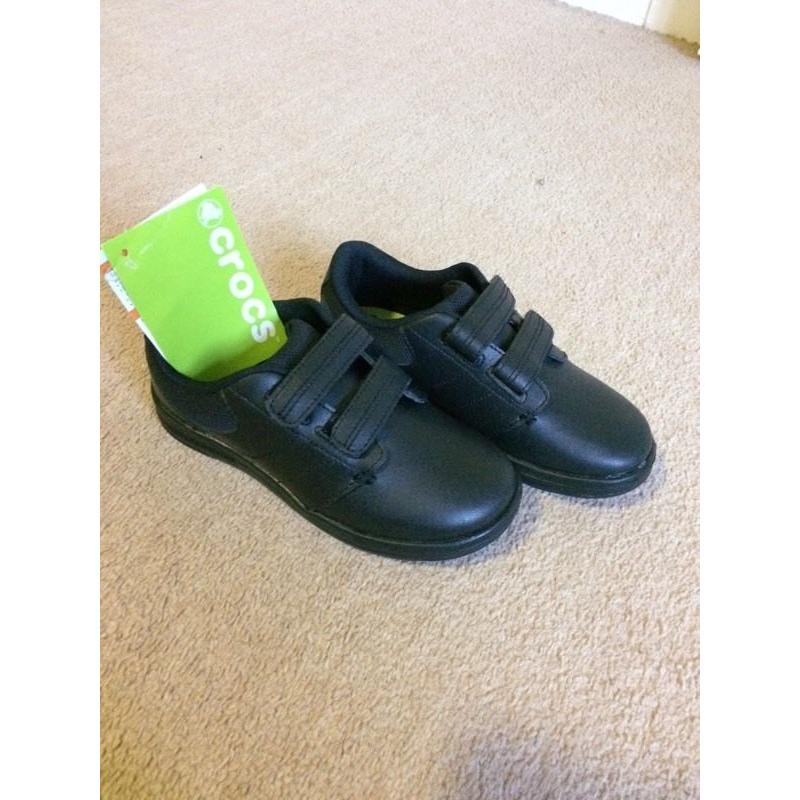 Brand new Crocs. Size 12/13 boys black school shoes.