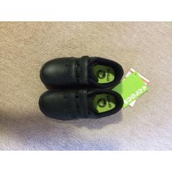 Brand new Crocs. Size 12/13 boys black school shoes.
