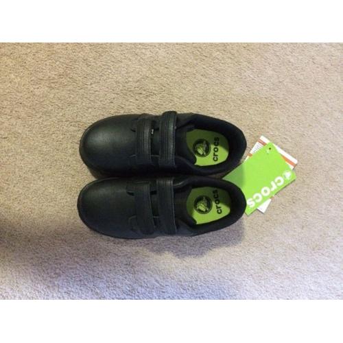 Brand new Crocs. Size 12/13 boys black school shoes.