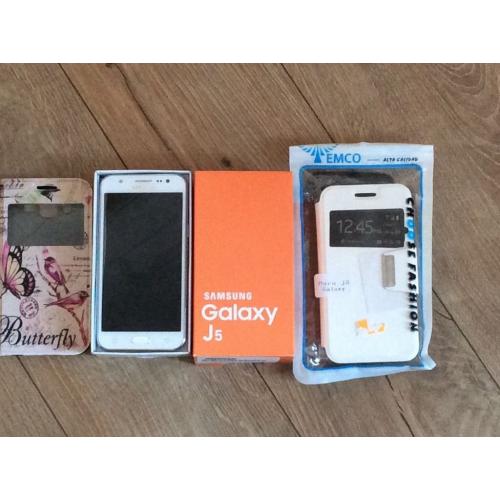 Samsung Galaxy j5 very good condition,original box new earphones plug open to any network.