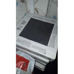 Black or charcoal large floor tiles