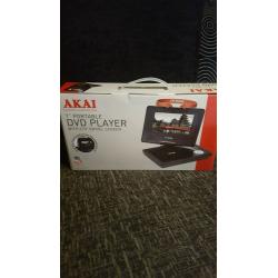 Portable dvd player with car fitment case and adaptors brand new