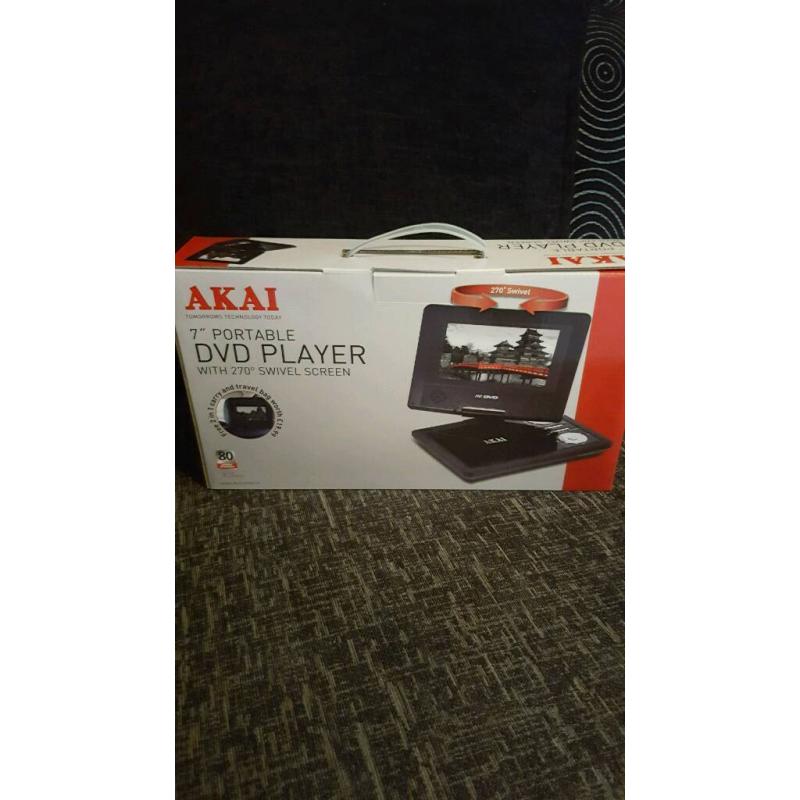 Portable dvd player with car fitment case and adaptors brand new