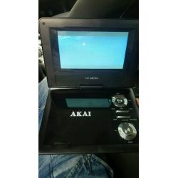 Portable dvd player with car fitment case and adaptors brand new