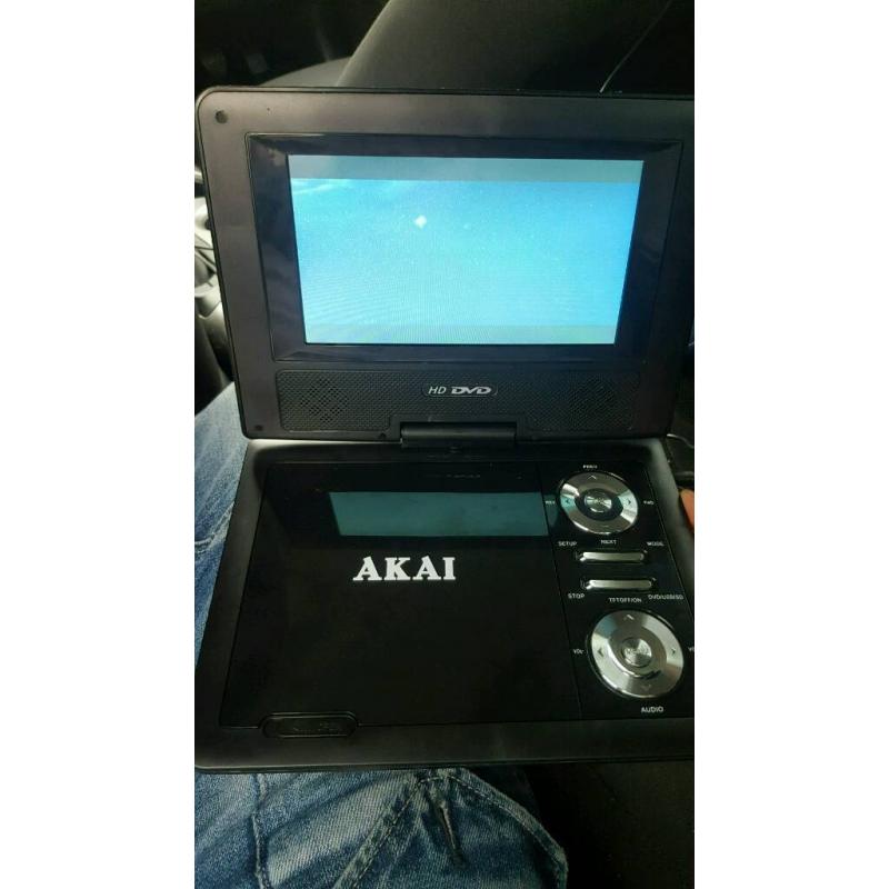 Portable dvd player with car fitment case and adaptors brand new