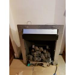 Fire surround with gas log effect fire