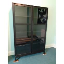 Large solid pine shelving unit with glass doors