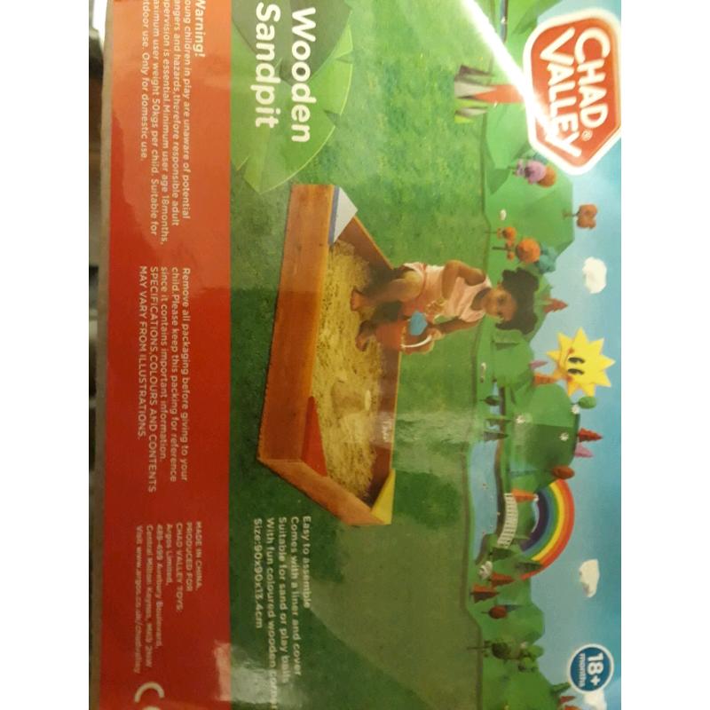 Bn wooden sandpit with sand