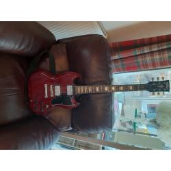 Sg cherry red guitar