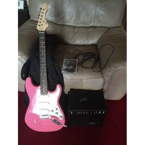 Full size electric guitar, amp, padded case, leads, and guitar tuner