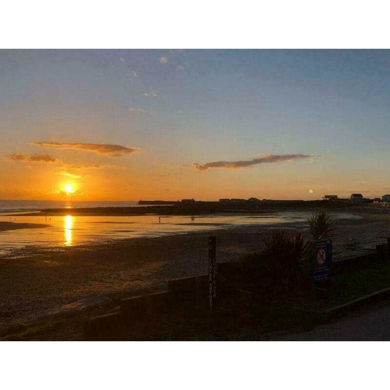 new sea front caravan for sale with decking at trecco bay FREE 2021 PITCH FEES