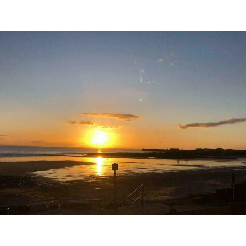 new sea front caravan for sale with decking at trecco bay FREE 2021 PITCH FEES