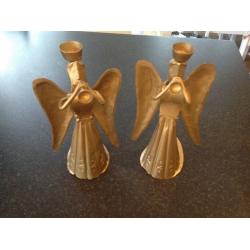 Pair of metal angel candle holders.