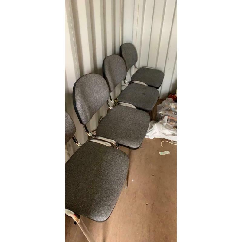 Four grey office chairs stackable vgc ( can deliver)