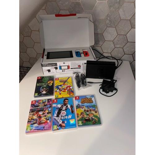 Nintendo switch with 5 Games boxed