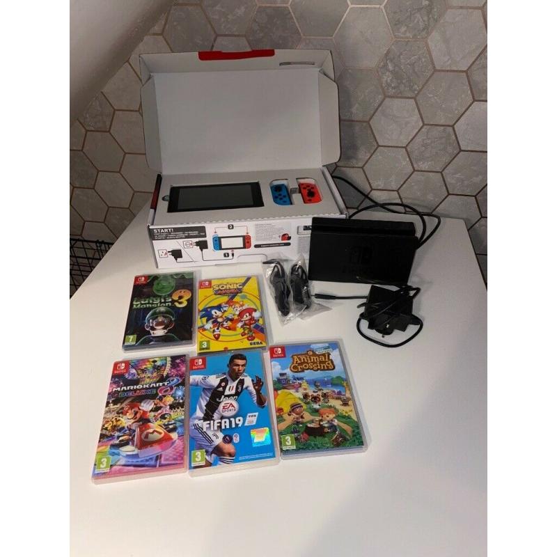 Nintendo switch with 5 Games boxed