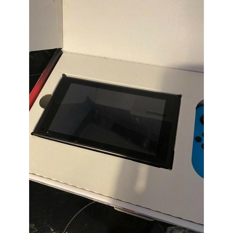 Nintendo switch with 5 Games boxed