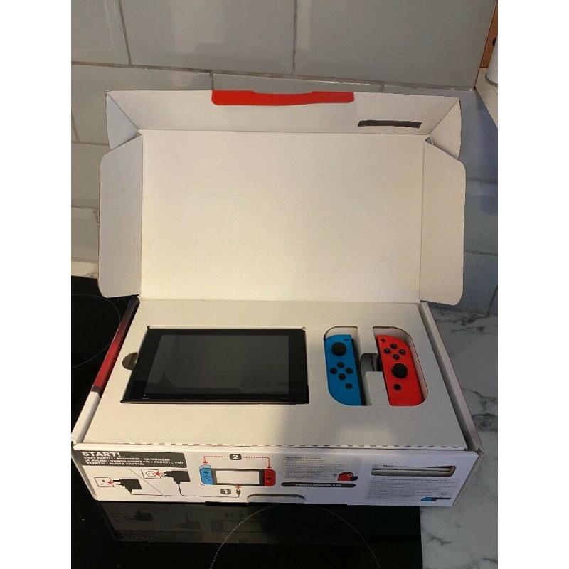 Nintendo switch with 5 Games boxed