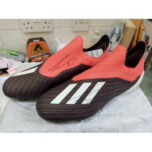 Autographed pair of brand new Troy deanie football boots