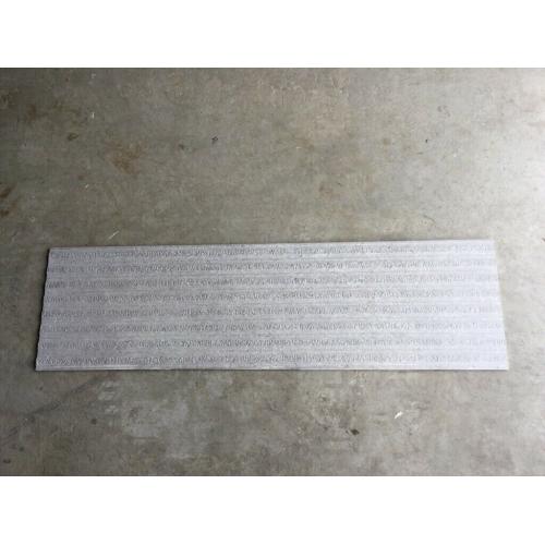Porcelanosa Mombasa Prada Asero grey ribbed designer wall tile. 120 x 33.5 cm.