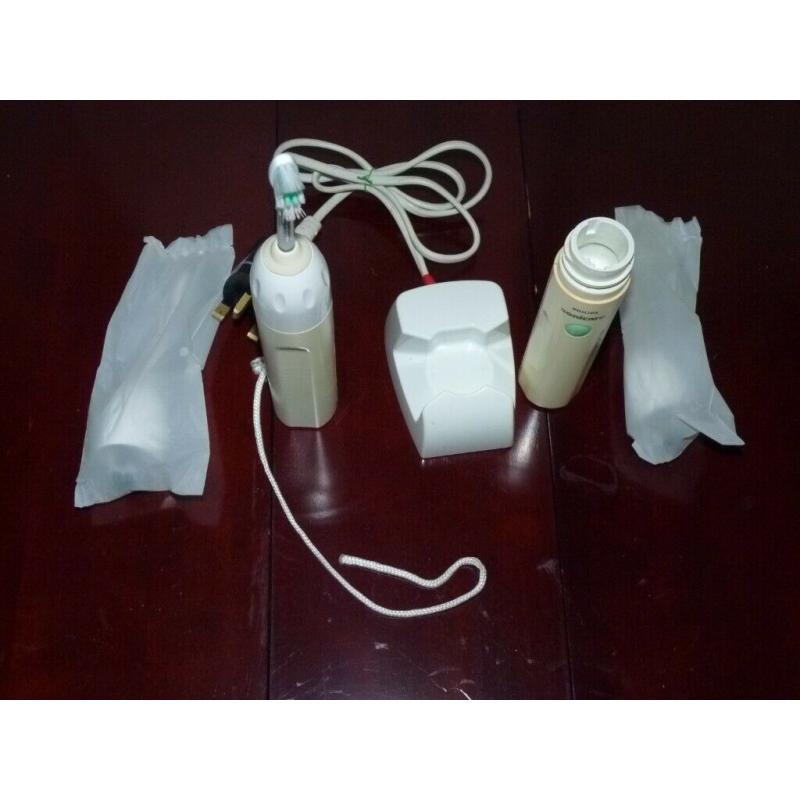 2 philips sonicare electric, charger, 2 new brushes