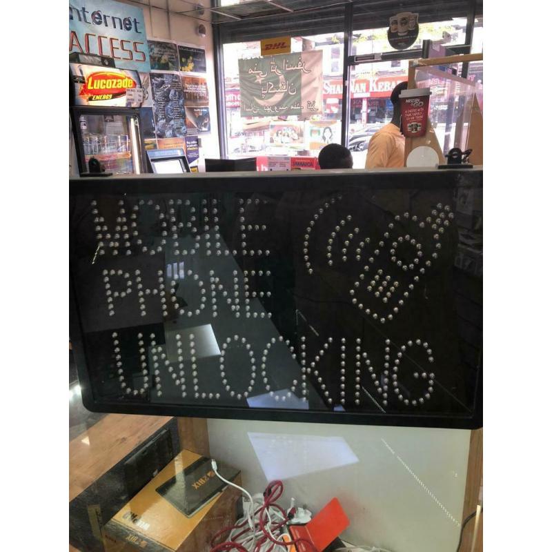 Mobile phone unlocking led sign