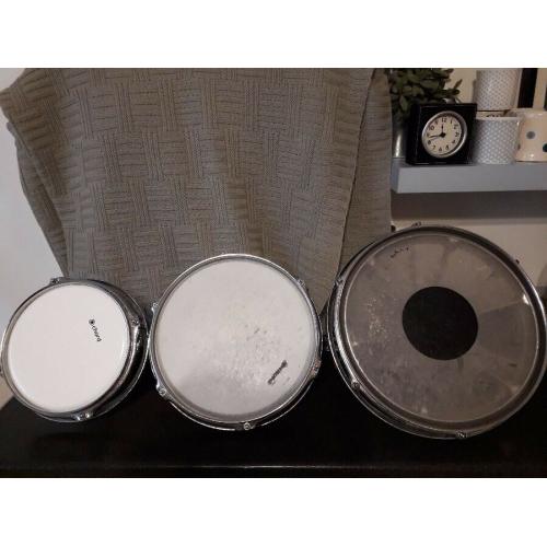 8",10",12" Remo RotoToms with link bar.