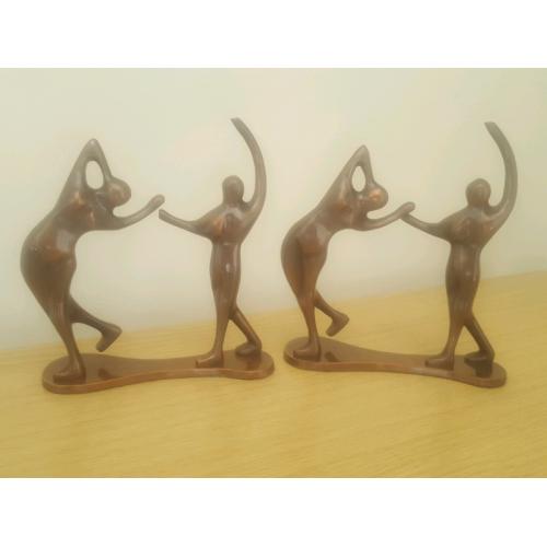 As good as new pair of ornamental metal figurines.