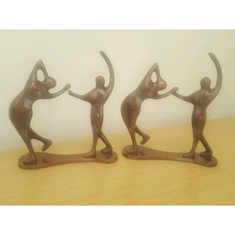 As good as new pair of ornamental metal figurines.