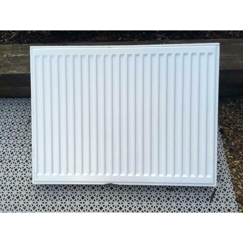 Two Stelrad P+ small radiators 700 and 800mm wide (both 600h)