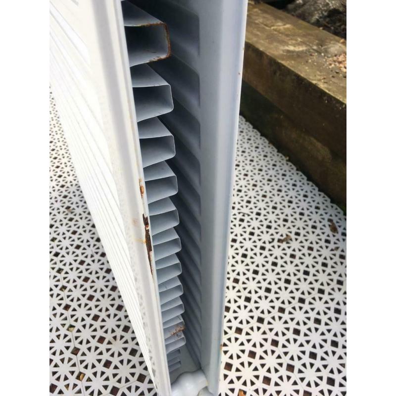 Two Stelrad P+ small radiators 700 and 800mm wide (both 600h)