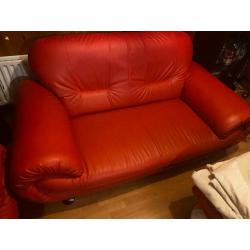 Red leather sofas