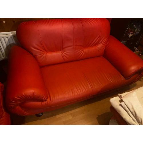 Red leather sofas