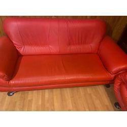 Red leather sofas