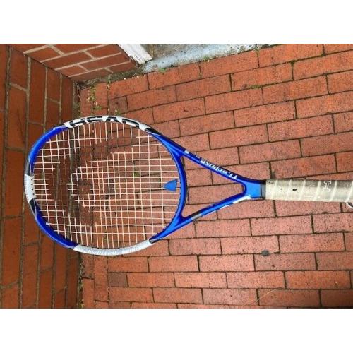 Two Tennis rackets. One Wilson, One Head. Very lightweight.