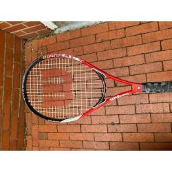 Two Tennis rackets. One Wilson, One Head. Very lightweight.