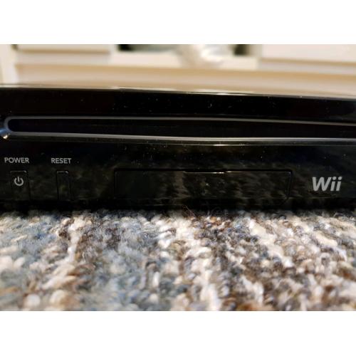 Nintendo Wii with guitar hero