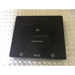 Sega Saturn console with pad and games for sale