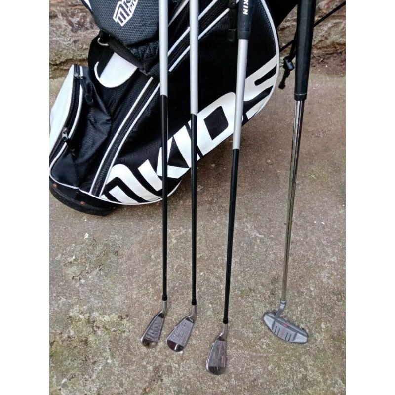 Junior golf clubs and stand bag
