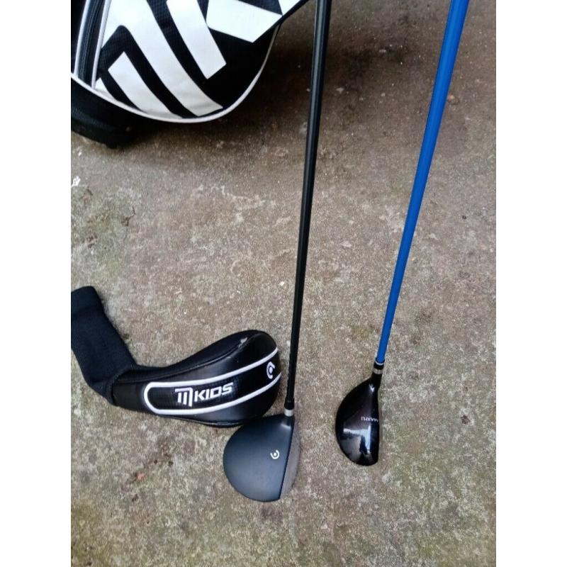 Junior golf clubs and stand bag
